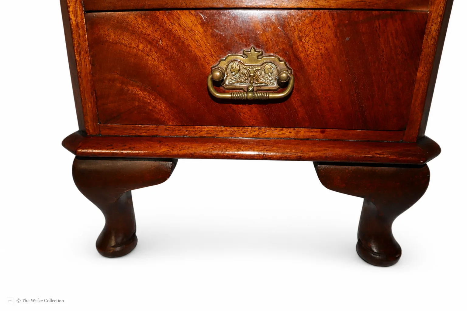 Early 20th-century walnut miniature chest of small proportions, with moulded rectangular top and clipped corners, six graduated drawers fitted with brass swing handles, and short cabriole feet; 67cm high, 28cm wide, 22cm deep thumbnail 8