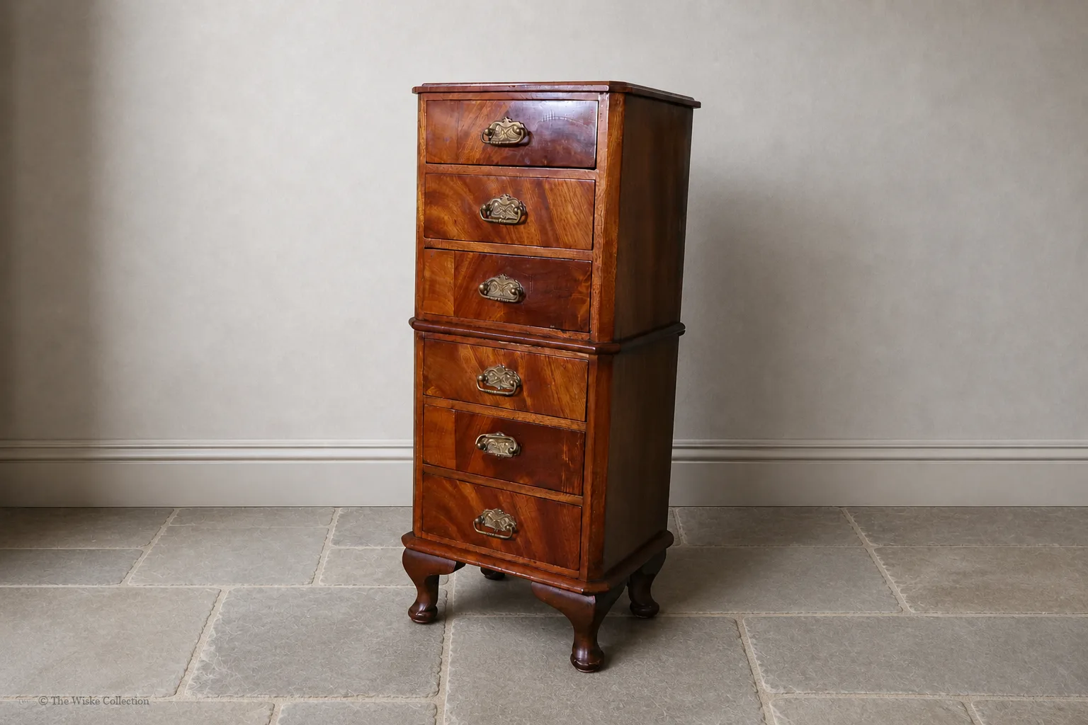 Early 20th-century walnut miniature chest of small proportions, with moulded rectangular top and clipped corners, six graduated drawers fitted with brass swing handles, and short cabriole feet; 67cm high, 28cm wide, 22cm deep thumbnail 7