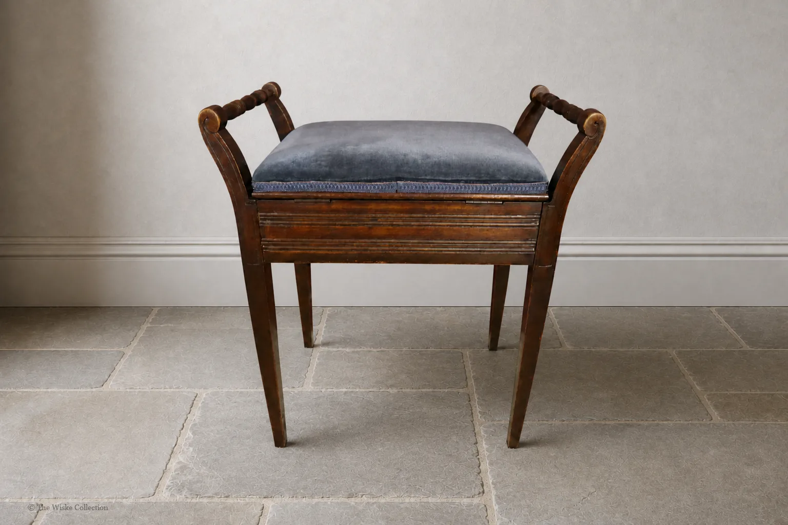 An Edwardian piano stool featuring a blue upholstered hinged seat, turned arms and tapering supports; wood frame with textile upholstery and metal hinges thumbnail 6