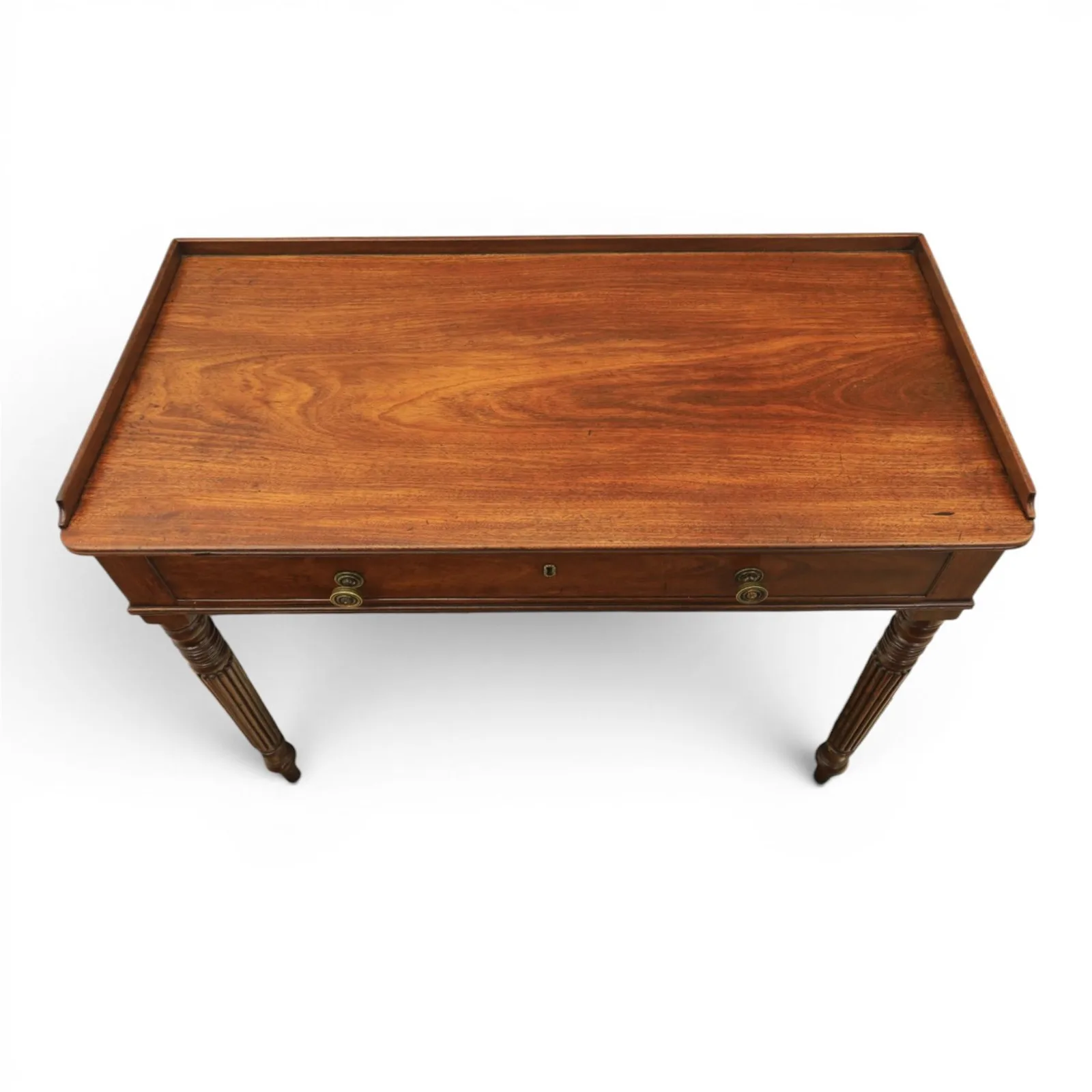 Regency English mahogany dressing table, stamped Gillow, early 19th century; rectangular top with three-quarter gallery above a frieze drawer with twin brass knobs; raised on turned and reeded supports thumbnail 4