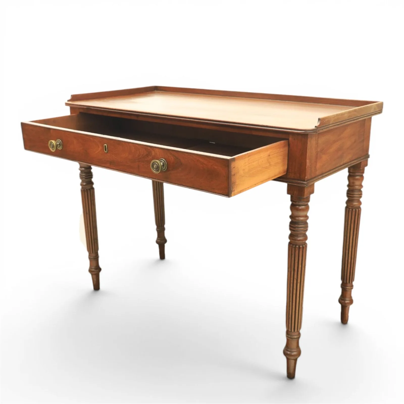 Regency English mahogany dressing table, stamped Gillow, early 19th century; rectangular top with three-quarter gallery above a frieze drawer with twin brass knobs; raised on turned and reeded supports thumbnail 6