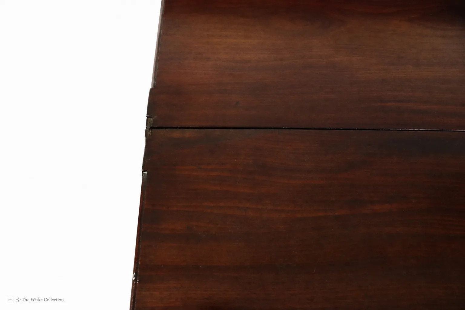 Georgian mahogany turnover-top tea table; rectangular hinged leaf unfolds to a square surface; single frieze drawer with brass swan-neck handle and escutcheon; square tapering legs thumbnail 13