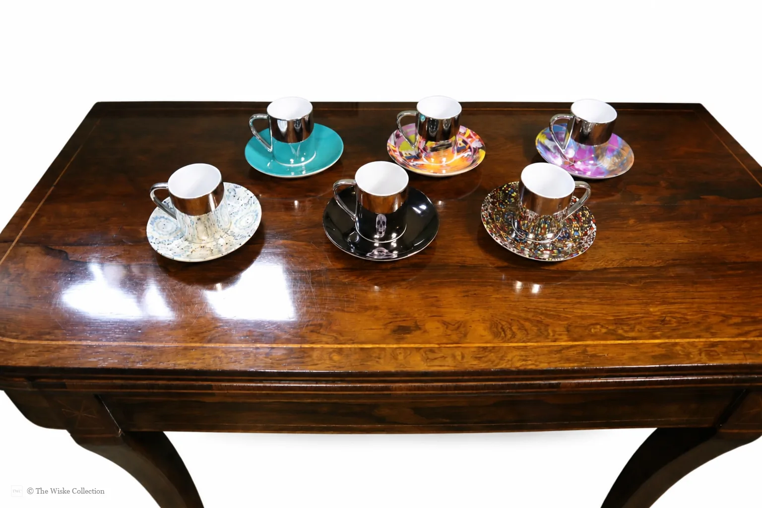 Damien Hirst (British 1965-); set of six anamorphic silver lustre espresso cups and saucers of various designs thumbnail 23