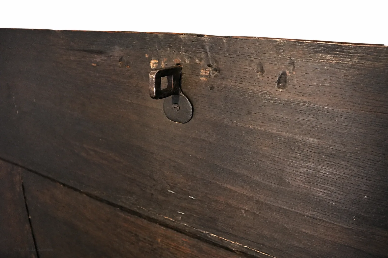 19th-century carved oak coffer; rectangular plank top over a four-panel front with lozenge and flowerhead carving, shaped lower apron, stile feet; sturdy provincial work thumbnail 6