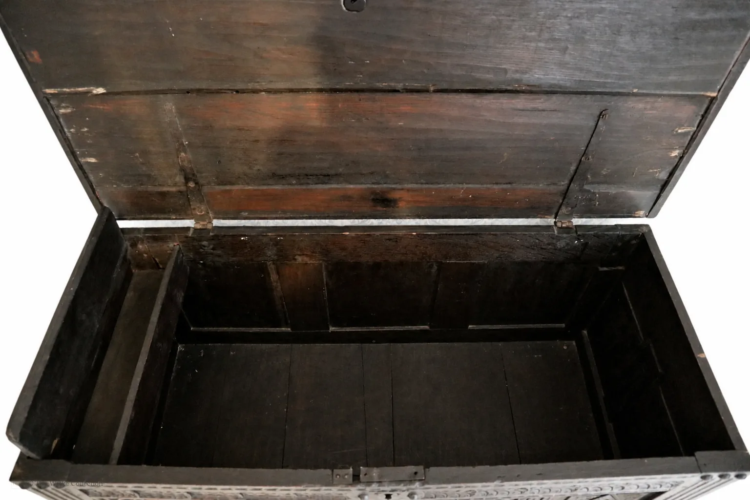 19th-century carved oak coffer; rectangular plank top over a four-panel front with lozenge and flowerhead carving, shaped lower apron, stile feet; sturdy provincial work thumbnail 7