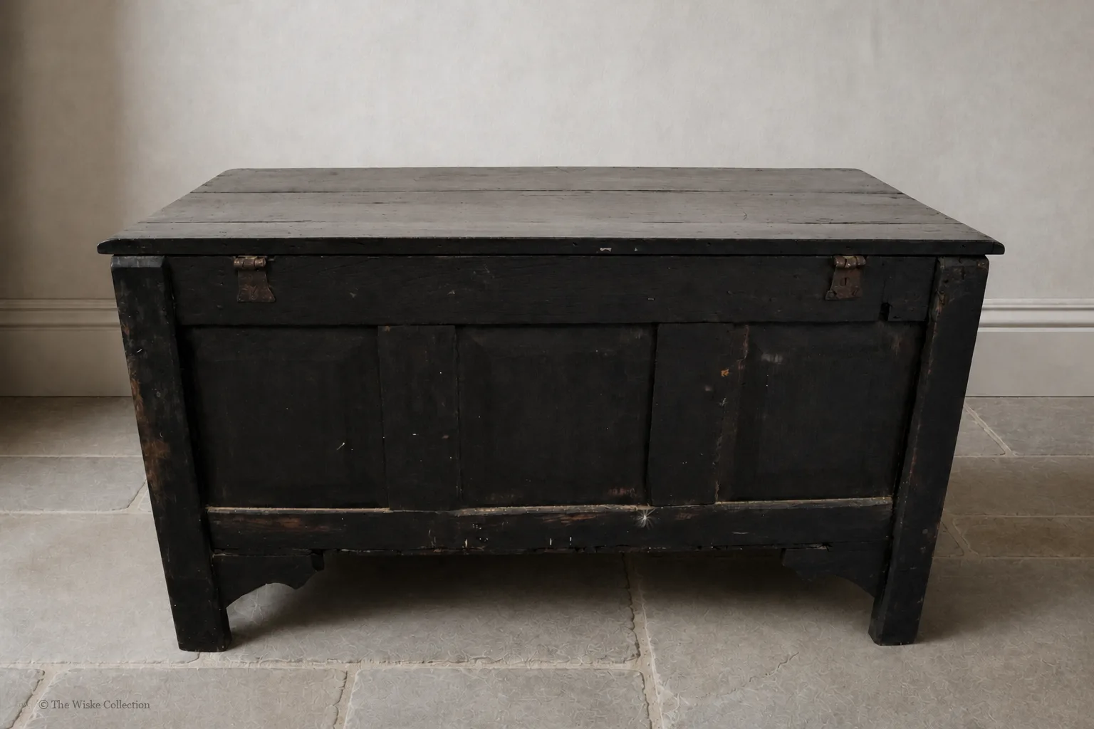 19th-century carved oak coffer; rectangular plank top over a four-panel front with lozenge and flowerhead carving, shaped lower apron, stile feet; sturdy provincial work thumbnail 8
