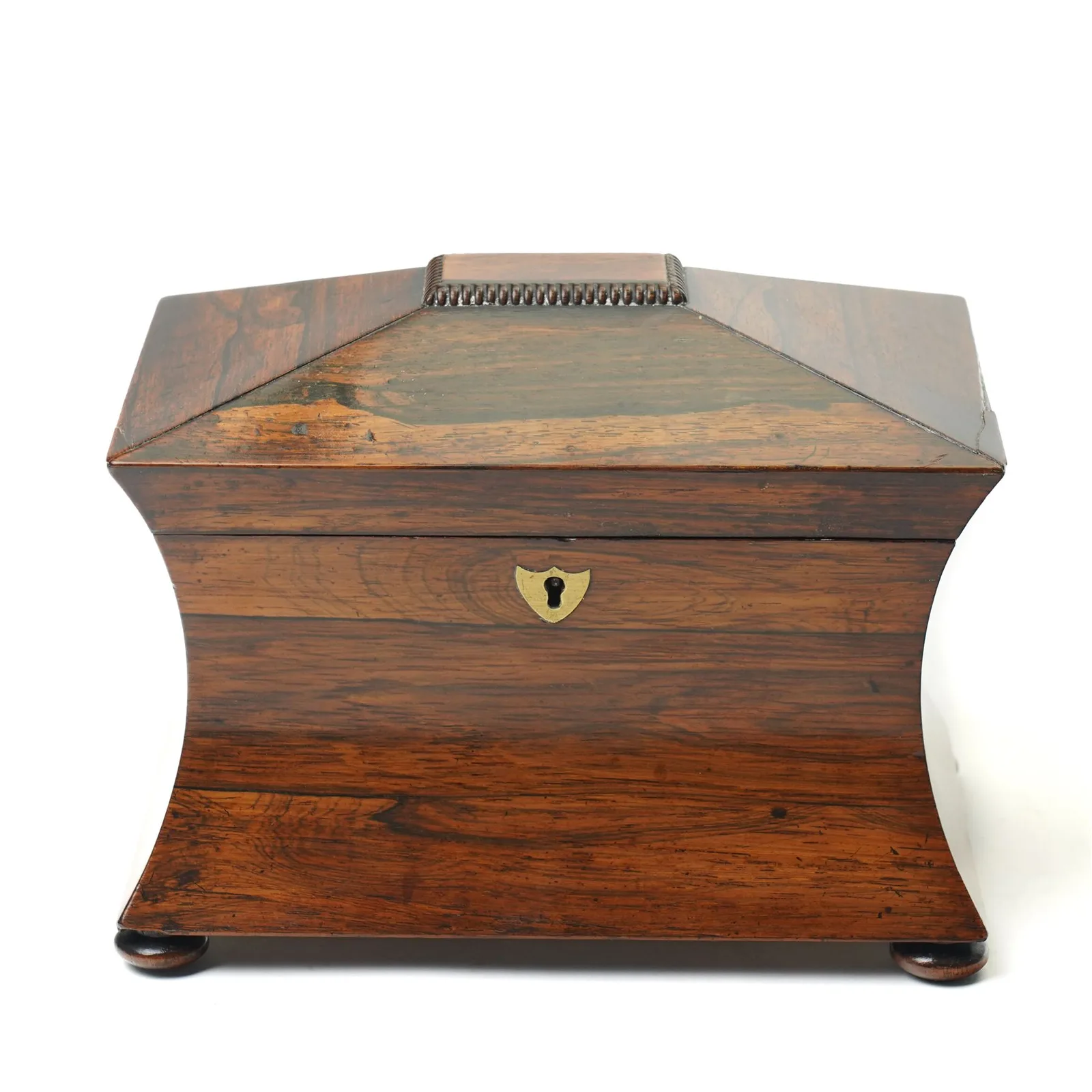 Early 19th century rosewood tea caddy of waisted sarcophagus form, twin compartments, on compressed bun feet, brass keyplate, H17cm W22cm thumbnail 2