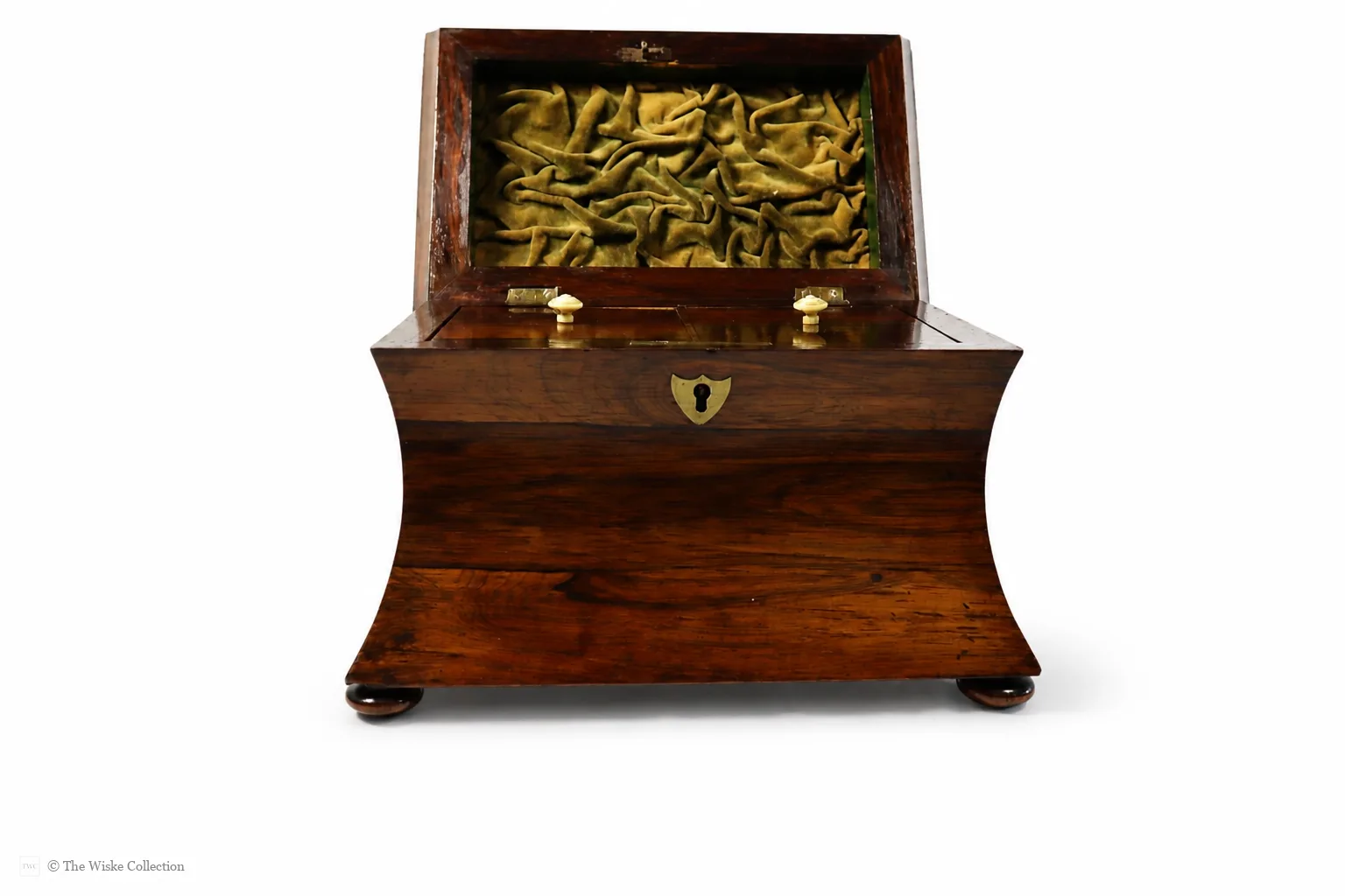 Early 19th-century rosewood tea caddy of waisted sarcophagus form, with twin compartments, brass keyplate, and compressed bun feet; 17cm high, 22cm wide thumbnail 2