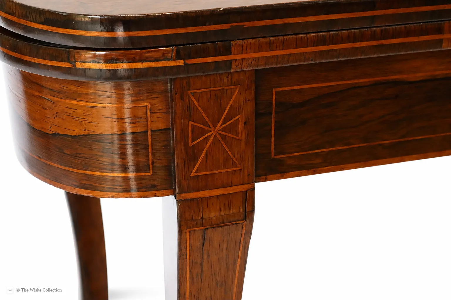Beautiful Regency rosewood folding tea table, early 19th century, rounded rectangular top with satinwood banding and crossbanded frieze; hinged fold-over action; raised on tapered square supports with brass castors thumbnail 3