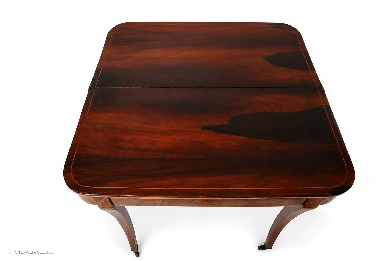 Beautiful Regency rosewood folding tea table, early 19th century, rounded rectangular top with satinwood banding and crossbanded frieze; hinged fold-over action; raised on tapered square supports with brass castors thumbnail 8