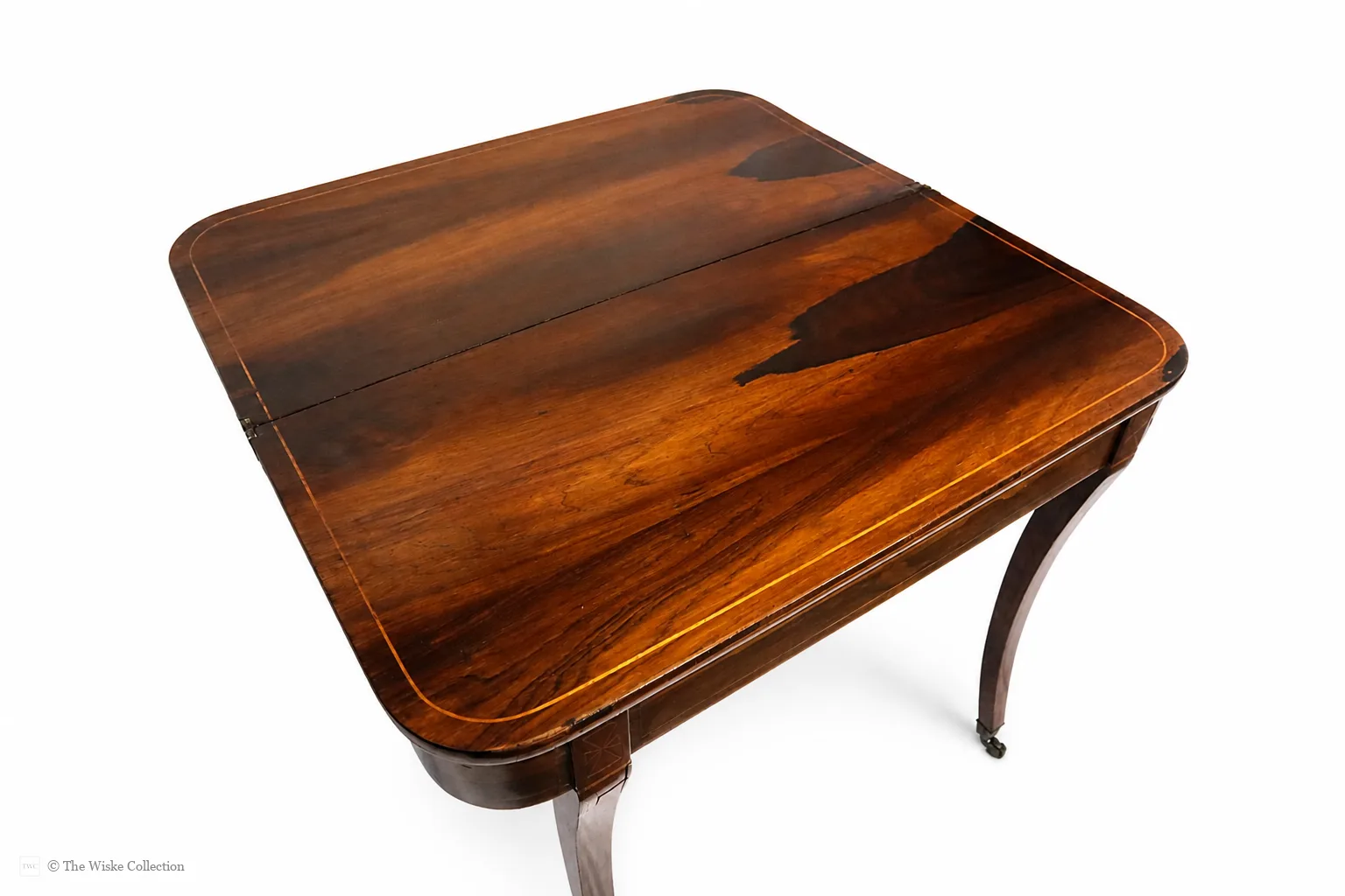 Beautiful Regency rosewood folding tea table, early 19th century, rounded rectangular top with satinwood banding and crossbanded frieze; hinged fold-over action; raised on tapered square supports with brass castors thumbnail 11