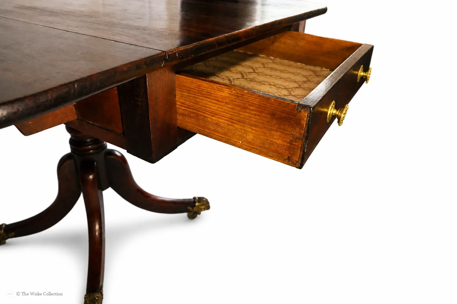English late Regency mahogany drop-leaf Pembroke table, maker unknown, rectangular with rounded corners, frieze and blind drawers; raised on a turned pedestal with splayed legs ending in brass lion-paw feet and castors thumbnail 16