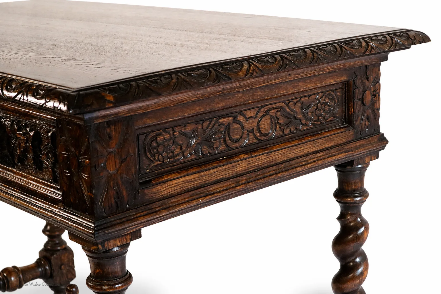Victorian carved oak side table with solid moulded and carved rectangular top, deep frieze of foliate-carved twin drawers flanking a central panel, on barley-twist legs united by a shaped stretcher with turned knop, ending in block feet thumbnail 6