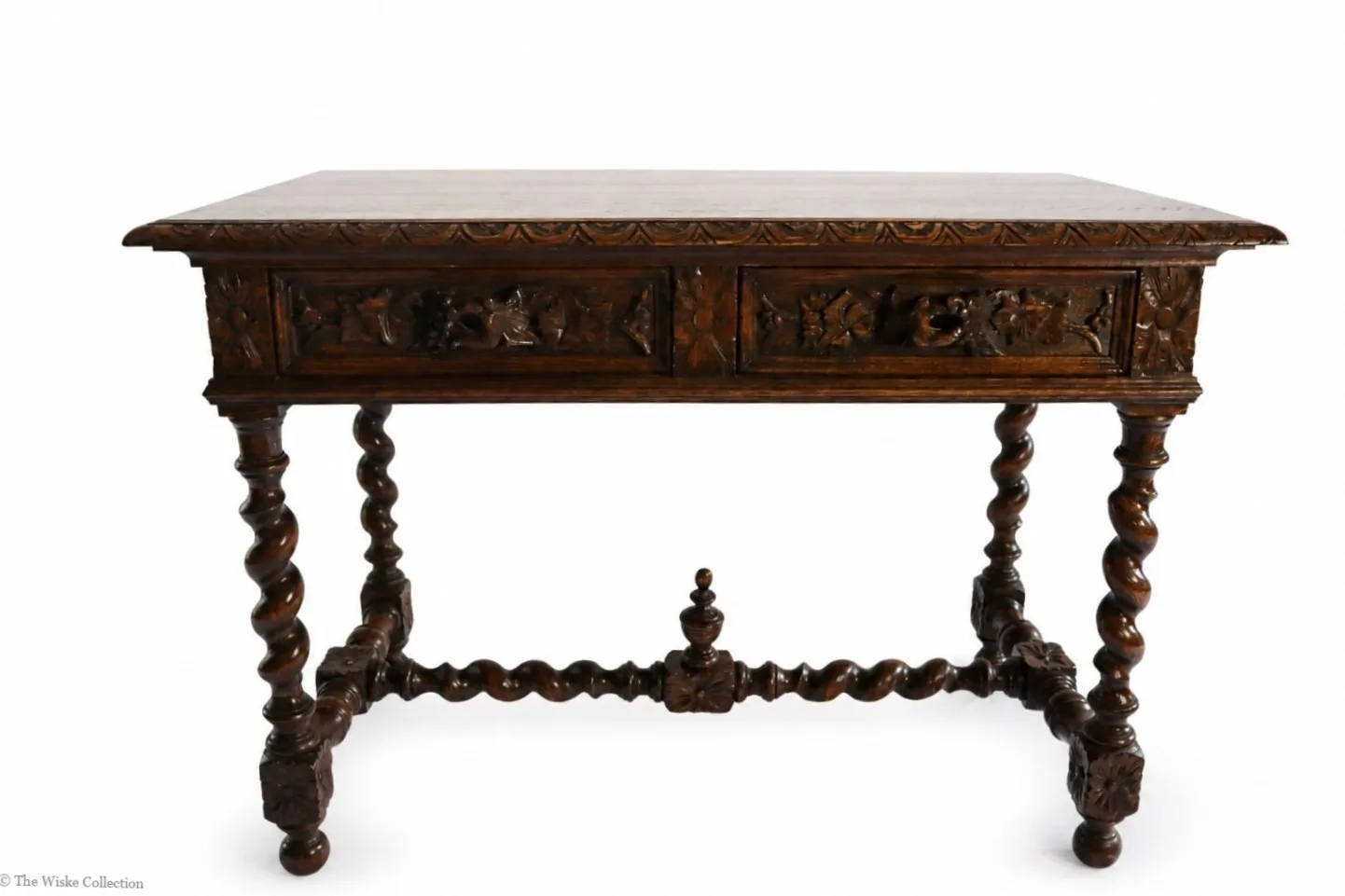 Victorian carved oak side table with solid moulded and carved rectangular top, deep frieze of foliate-carved twin drawers flanking a central panel, on barley-twist legs united by a shaped stretcher with turned knop, ending in block feet thumbnail 3