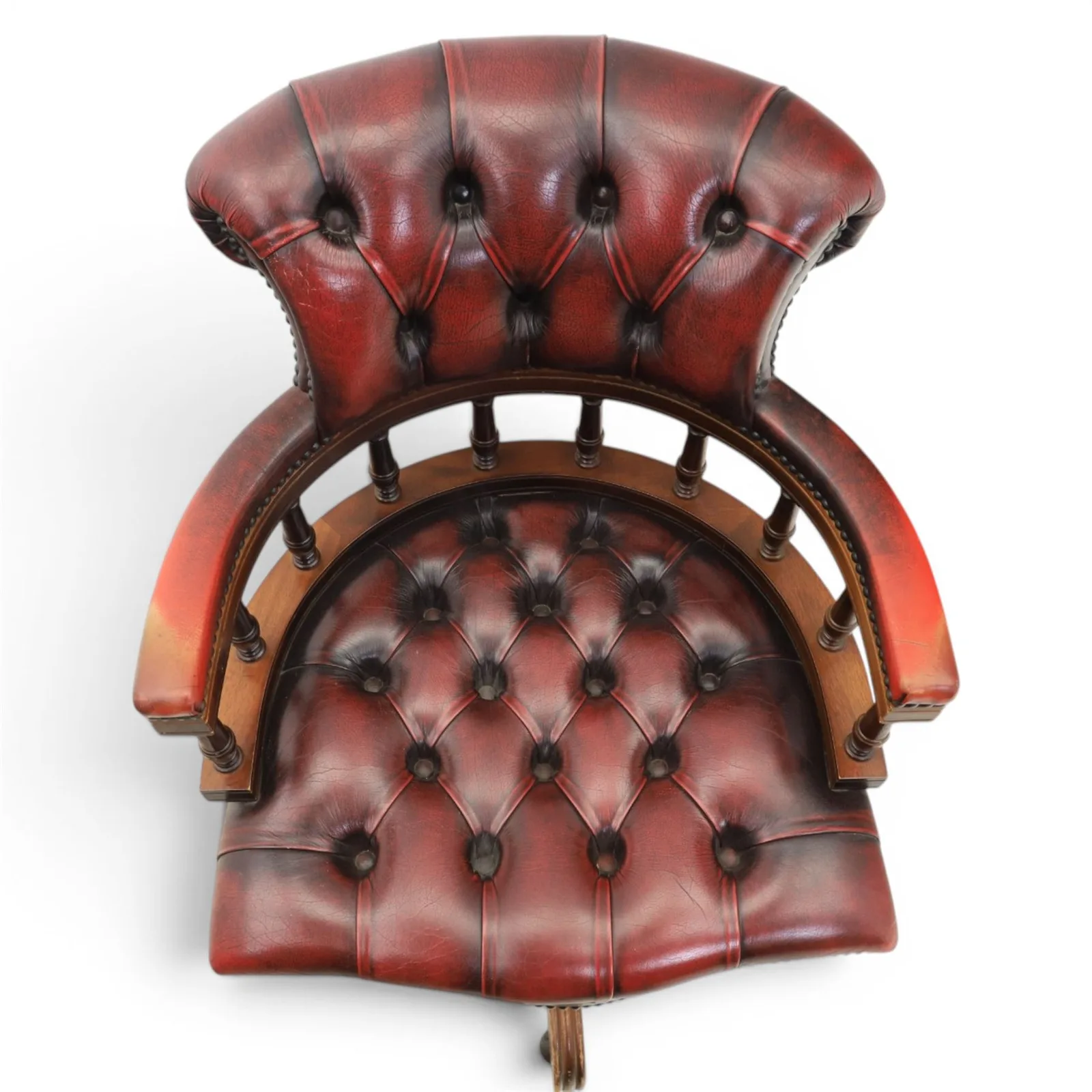 Captains swivel desk chair upholstered in oxblood leather, buttoned back and seat, shaped arm bow raised on turned spindles, five spoke base raised on castors thumbnail 4